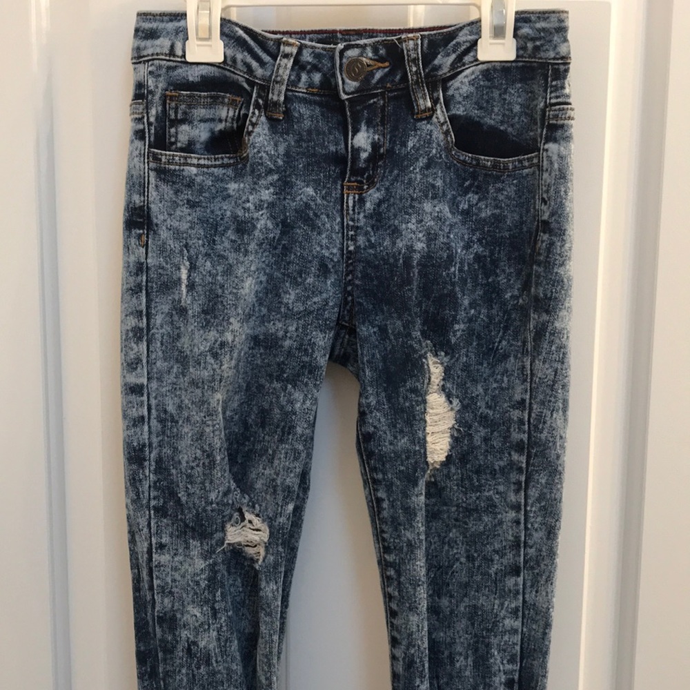Distressed medium wash skinny jeans